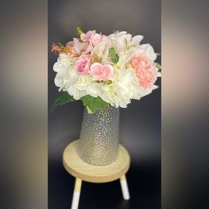 Whimsical Blooms: A Delicate Symphony of Pink and White in an Iridescent Vase